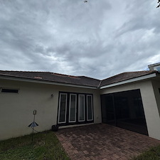 Clermont-Tile-Roof-Cleaning-Years-of-Black-Roof-Stains-Gone-Restoring-the-Beauty-and-Curb-Appeal-of-This-Home 0