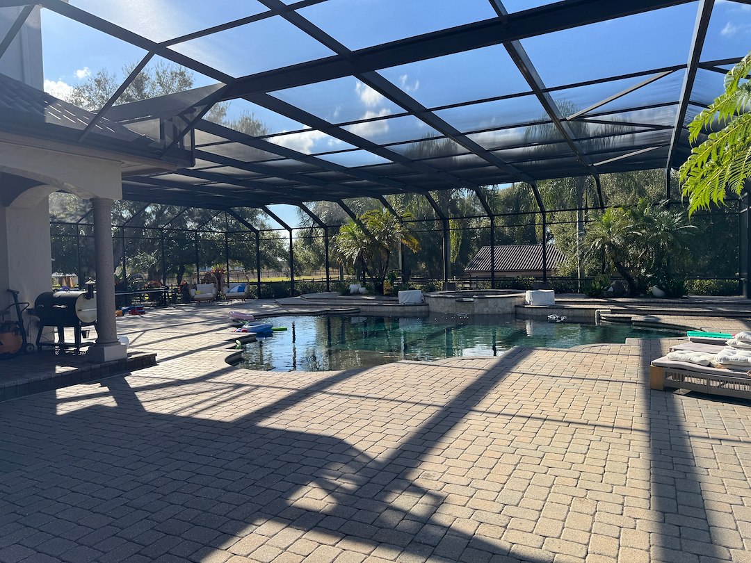 Professional pool screen enclosure and pool deck cleaning in Montverde, FL. Safe exterior cleaning using pressure washing and soft washing techniques. Call today at 352-255-8579 for a quote.